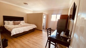 Premium bedding, down duvets, desk, laptop workspace