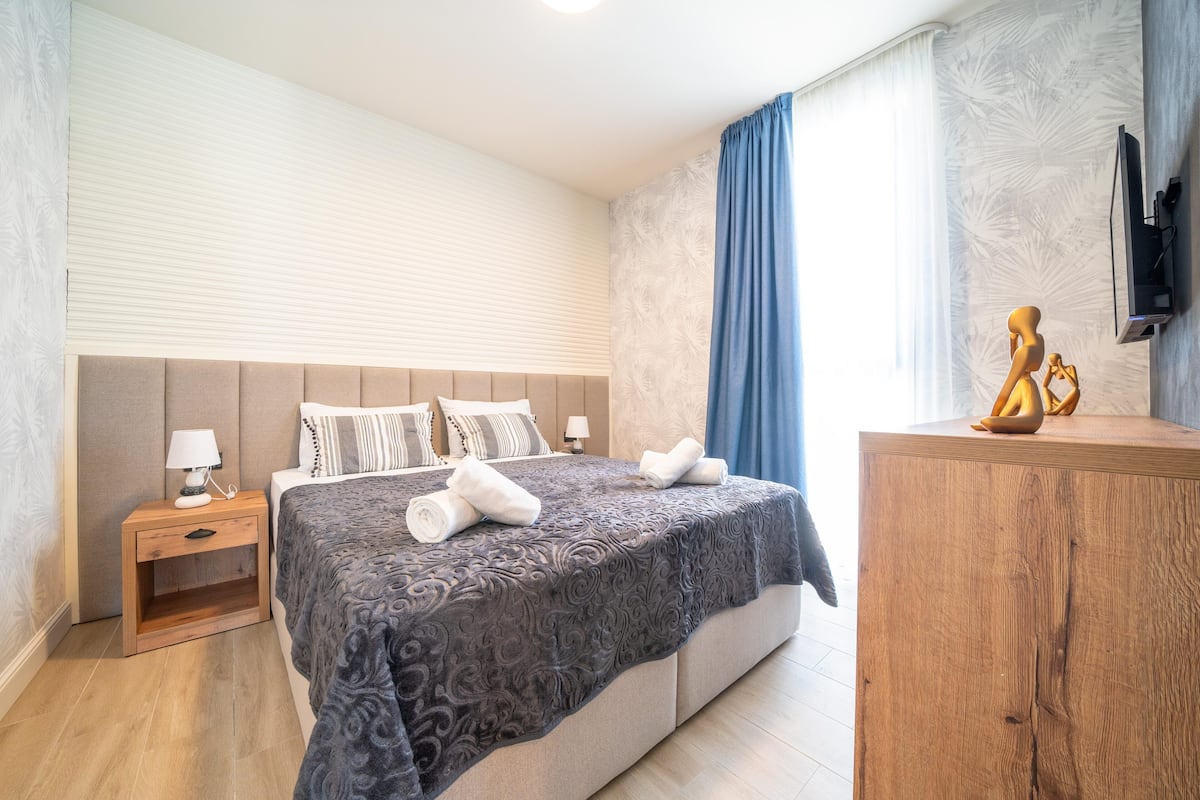 Luxe appartement, patio, uitzicht op oceaan | 1 slaapkamer, lakens van Egyptisch katoen, luxe beddengoed, een minibar