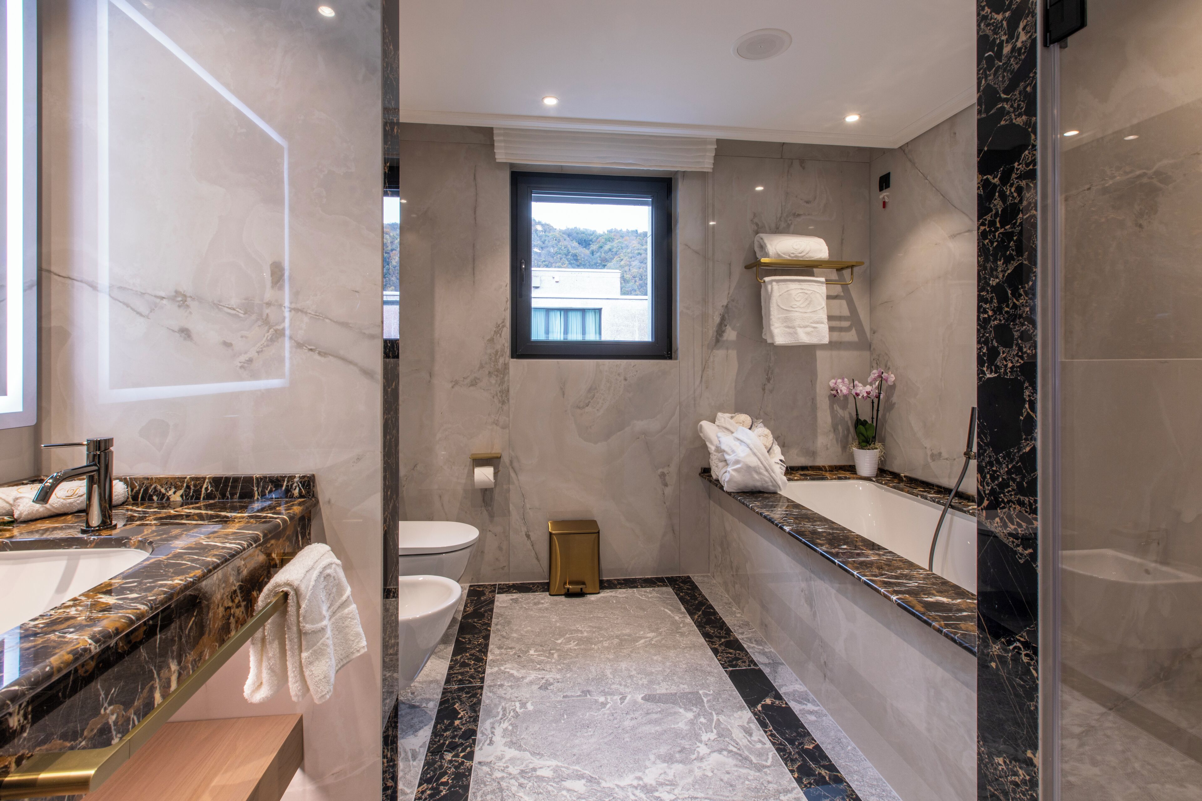 Deluxe Double Room, Terrace | Bathroom | Hair dryer, slippers, towels, soap