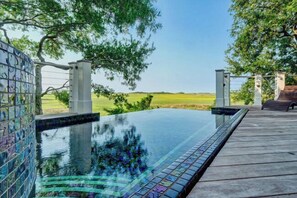 Pool - Beauitful marsh front, six bedroom home with infinity pool with hot tub. (Bald Head Island)