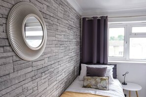 3 bedrooms, iron/ironing board, travel cot, WiFi