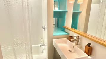 Hair dryer, towels, soap, shampoo
