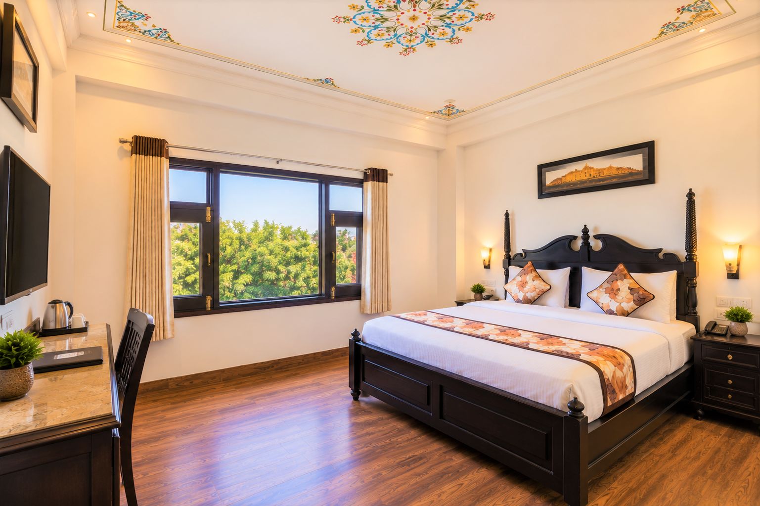 A hotel room with a large bed, a desk with a chair, a television, and a window with curtains.