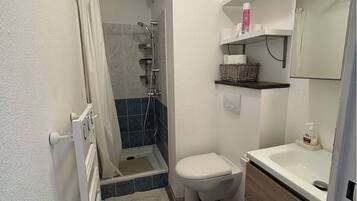 Hair dryer, towels, soap, toilet paper