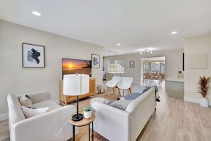 House, Multiple Beds, Kitchen, Garden View (Pompano Beach Bungalow) | Living area | 50-inch flat-screen TV with digital channels