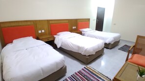 Comfort Triple Room | Desk, blackout drapes, soundproofing, iron/ironing board - Summit Hotel (Wadi Musa)