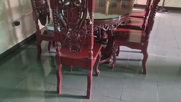 Fridge, griddle, freezer, dining tables