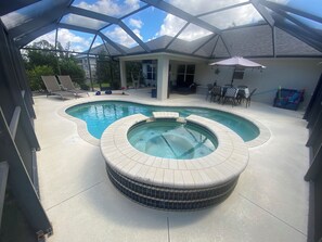 Outdoor pool, a heated pool - 4-bedroom tropical oasis pool home, family and dog friendly in Cape Coral. (Cape Coral)