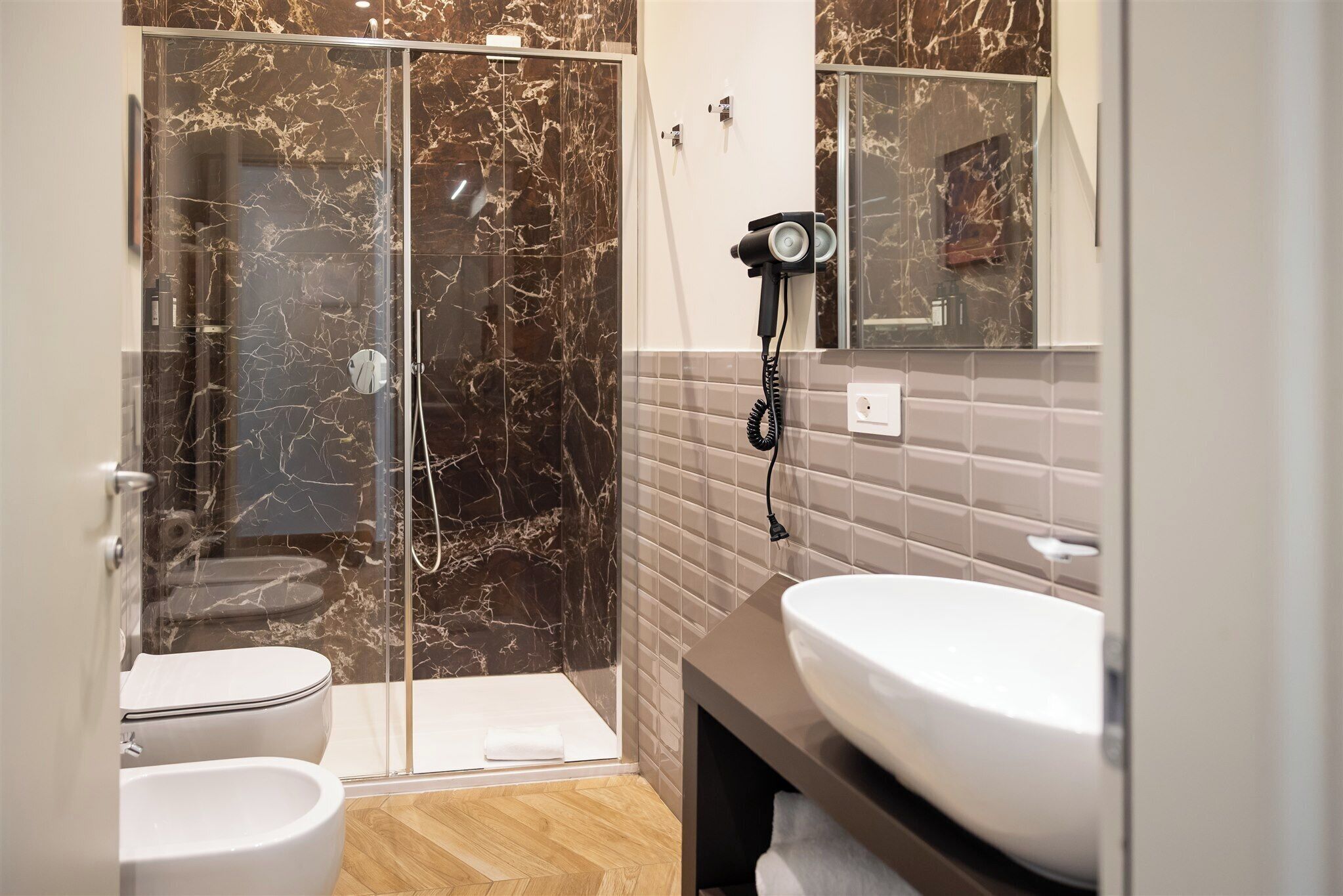 Superior Room | Bathroom | Rainfall showerhead, hair dryer, bidet, towels
