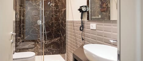 Superior Room | Bathroom | Rainfall showerhead, hair dryer, bidet, towels