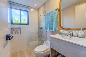 Shower, hair dryer, towels, soap