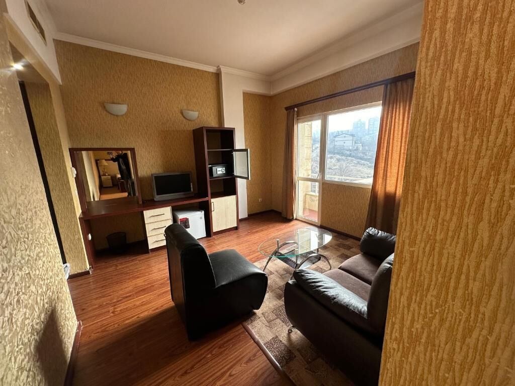 Family Quadruple Room | Living area