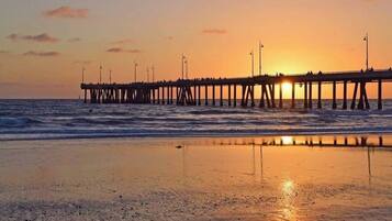 On the beach, sun-loungers, beach towels