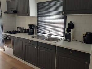 Fridge, microwave, dishwasher, coffee/tea maker