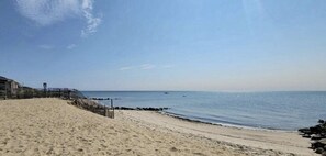 On the beach, sun-loungers