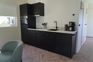 Fridge, microwave, dishwasher, coffee/tea maker