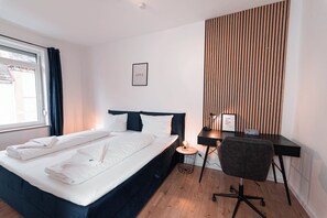 3 bedrooms, desk, iron/ironing board, travel cot