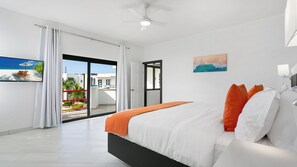 Deluxe Suite, Patio, Partial Sea View | In-room safe, blackout drapes, iron/ironing board, free WiFi - Genesis Residences (Cove Bay)