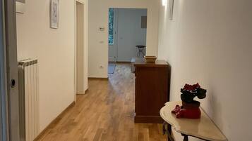 Apartamento conforto, vista para a cidade | Área de estar