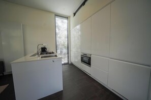 Microwave, dishwasher, dining tables