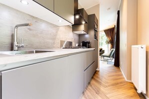 Fridge, microwave, dishwasher, coffee/tea maker