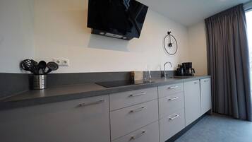 Fridge, microwave, dishwasher, coffee/tea maker