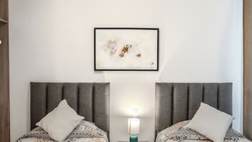 Habitación ejecutiva, 2 camas individuales | Caja fuerte, tabla de planchar con plancha, wifi gratis