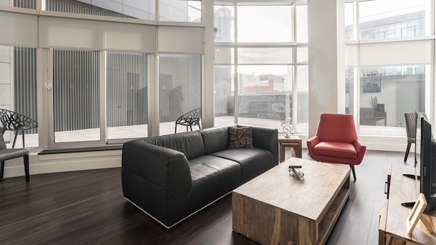 Living area - Modern Downtown 2BD Suite w/ Rooftop Terrace, Gym & Waterfront Views (Halifax)