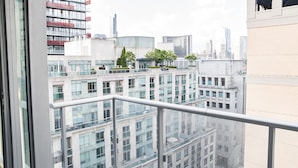 A high-rise building with multiple floors, large windows, and a modern architectural design.