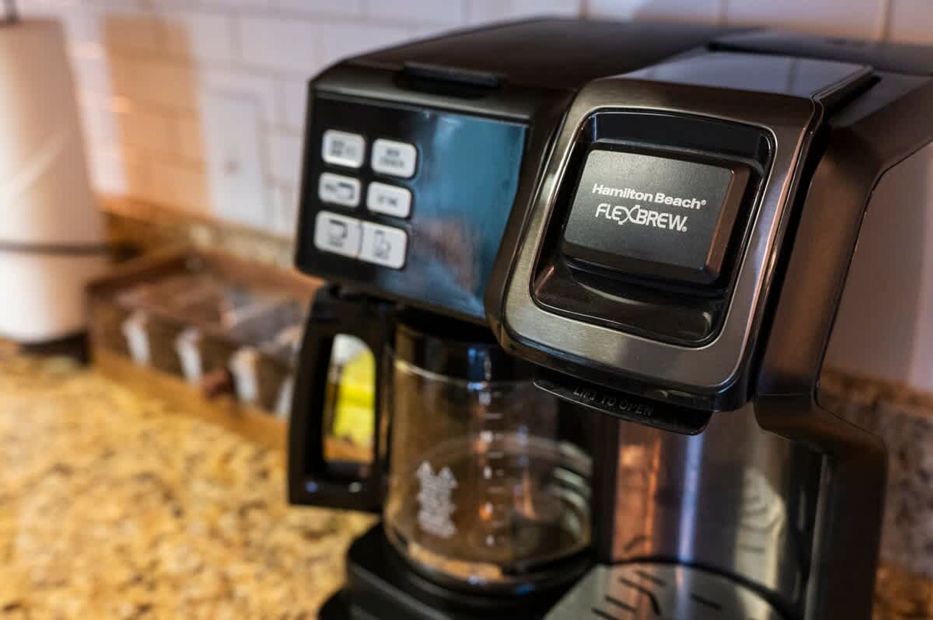 A Hamilton Beach FlexBrew coffee maker with a digital display and control panel.