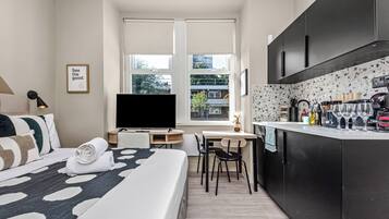 Desk, iron/ironing board, travel cot, WiFi