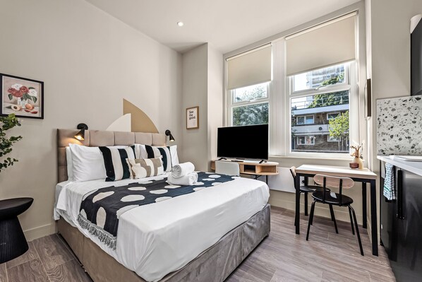 Desk, iron/ironing board, travel crib, WiFi