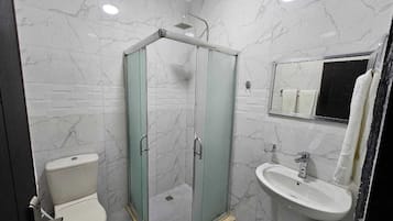 Shower, jetted bath, hair dryer, bidet