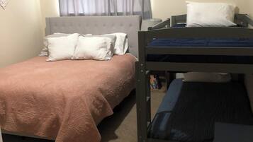 4 bedrooms, desk, iron/ironing board, travel cot