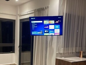 60-inch flat-screen TV with digital channels, TV - Penthouse Navela 405, by Cercana  (Telchac Puerto)