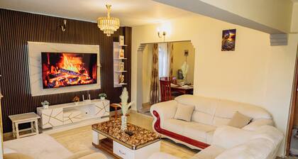 Welcome to your perfect getaway! This stunning 3-bedroom house, located in Thika