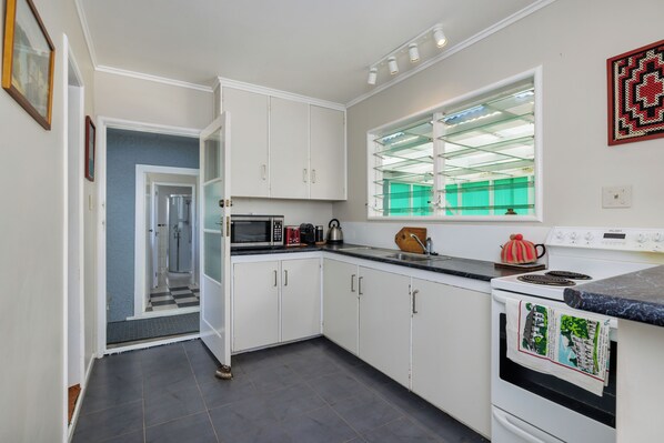 Fridge, microwave, coffee/tea maker, toaster