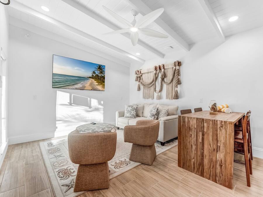 Deluxe Single Room | Living area | 55-inch Smart TV with cable channels, streaming services