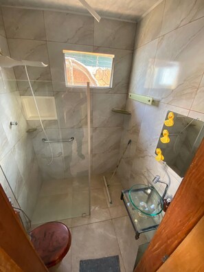 Shower, jetted bath, towels, soap