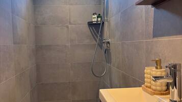 Shower, shampoo, toilet paper