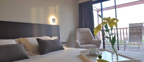 Chalet rustique, 2 chambres, baignoire à remous, face à la mer | 1 chambre, draps en coton égyptien, literie de qualité, couette en duvet