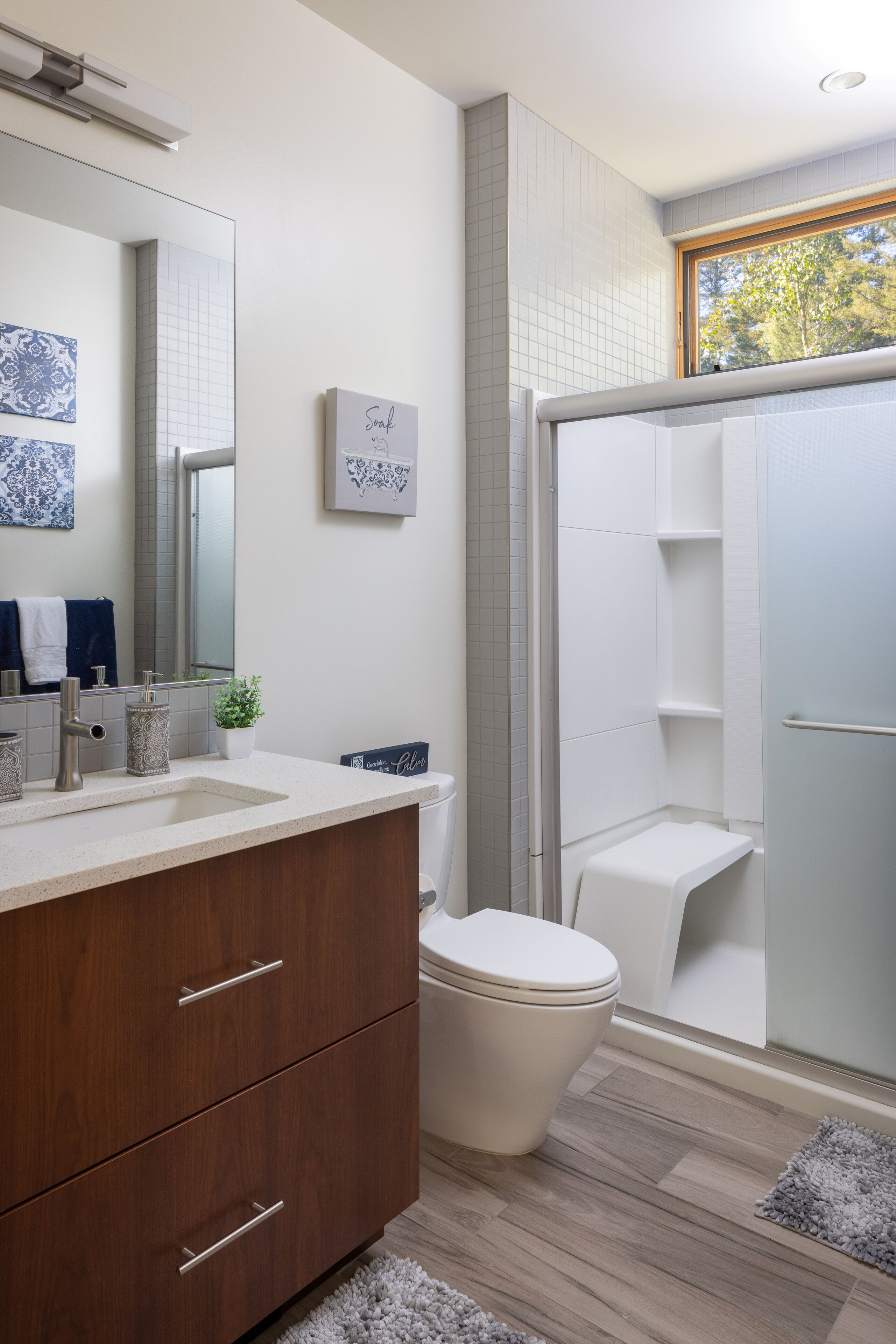 Shower, hair dryer, towels, toilet paper