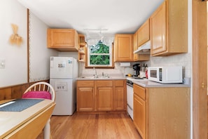 Fridge, microwave, stovetop, coffee/tea maker