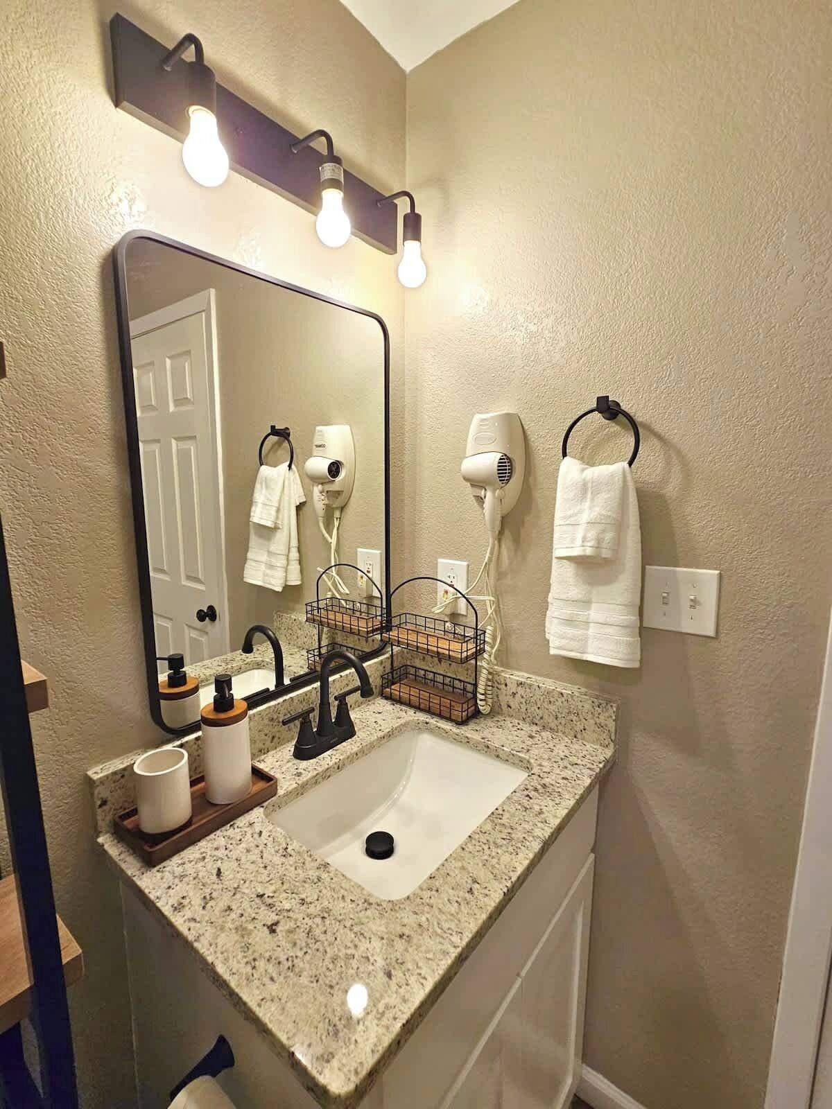 Hair dryer, towels, soap, toilet paper