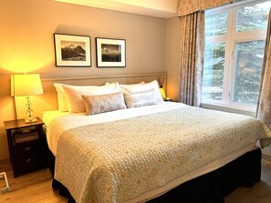 1 bedroom, desk, iron/ironing board, travel crib