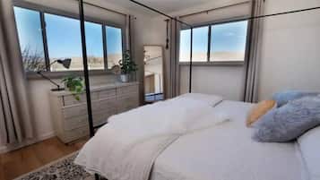 4 bedrooms, desk, iron/ironing board, travel cot