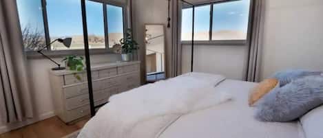 4 bedrooms, desk, iron/ironing board, travel cot