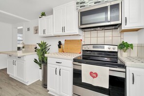 Microwave, oven, stovetop - Cozy and Spacious Tampa Home! Walk to the Water! (Tampa)