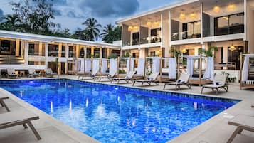 Outdoor pool, open 8:00 AM to 10:00 PM, cabanas (surcharge)
