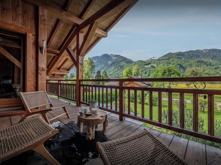 Terrace/patio. Chalet OCimes - authentic alpine stay 12p with sauna - OVO Network